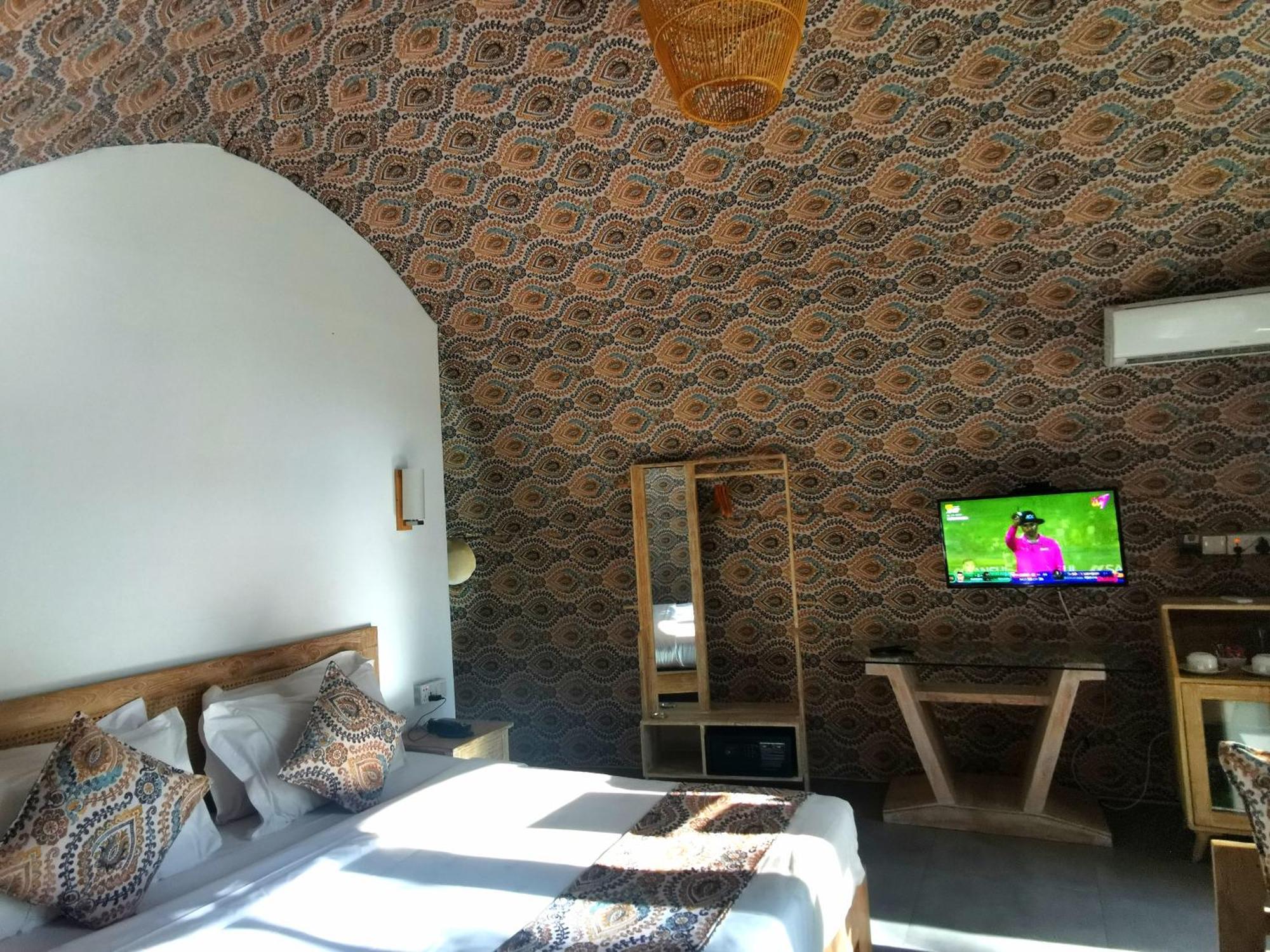 Nivadoo Resort Sigiriya Exterior photo A room at the hotel